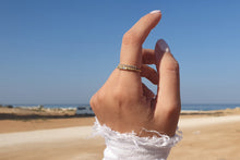 Load image into Gallery viewer, A unique 14K/18K gold textured ring featuring baguette and round diamonds